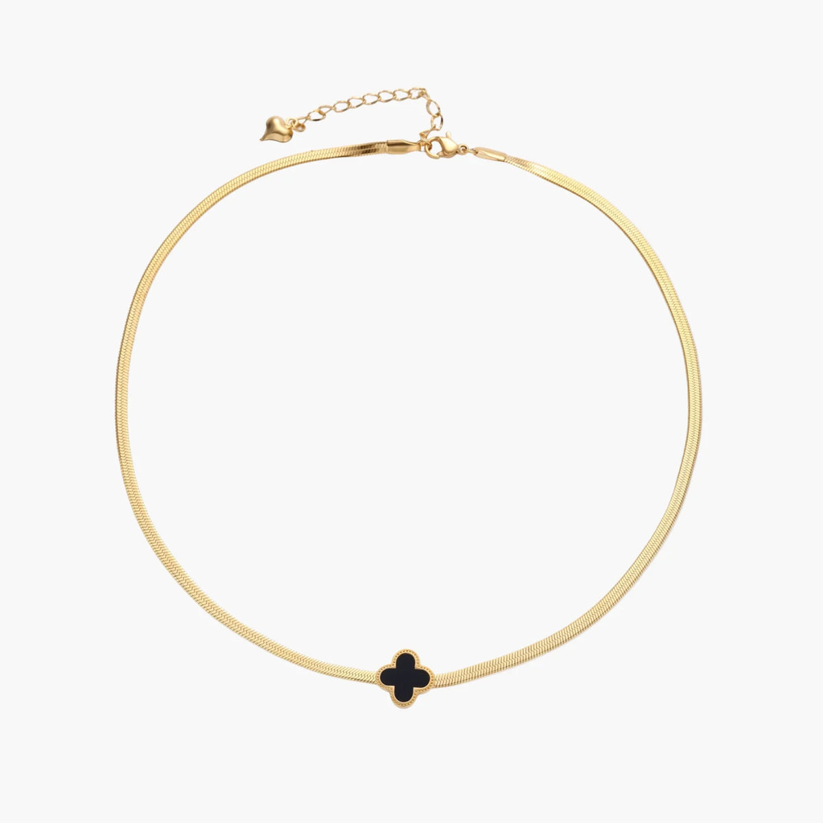 Dainty 18K gold-plated herringbone chain necklace with black enamel quatrefoil clover pendant on white background