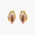 Gold-plated baroque stud earrings with coral-pink liuli stones and cubic zirconia crystals on white background.