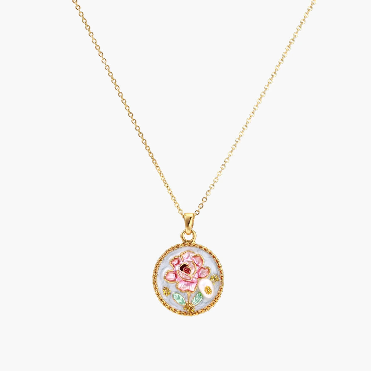 Gold-plated circular pendant with pink enamel rose, pearl background, and delicate beaded border on chain