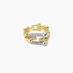 Triple-band gold ring with spherical bead chains and two crystal-pavé bars on cream background