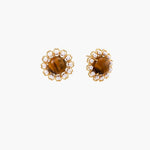 Gold-plated stud earrings with cushion-cut tiger's eye stones surrounded by pearl halos on white background.